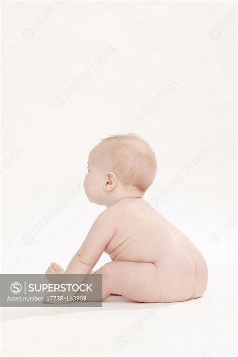 nude baby|Photograph of a baby boy nude in the sea